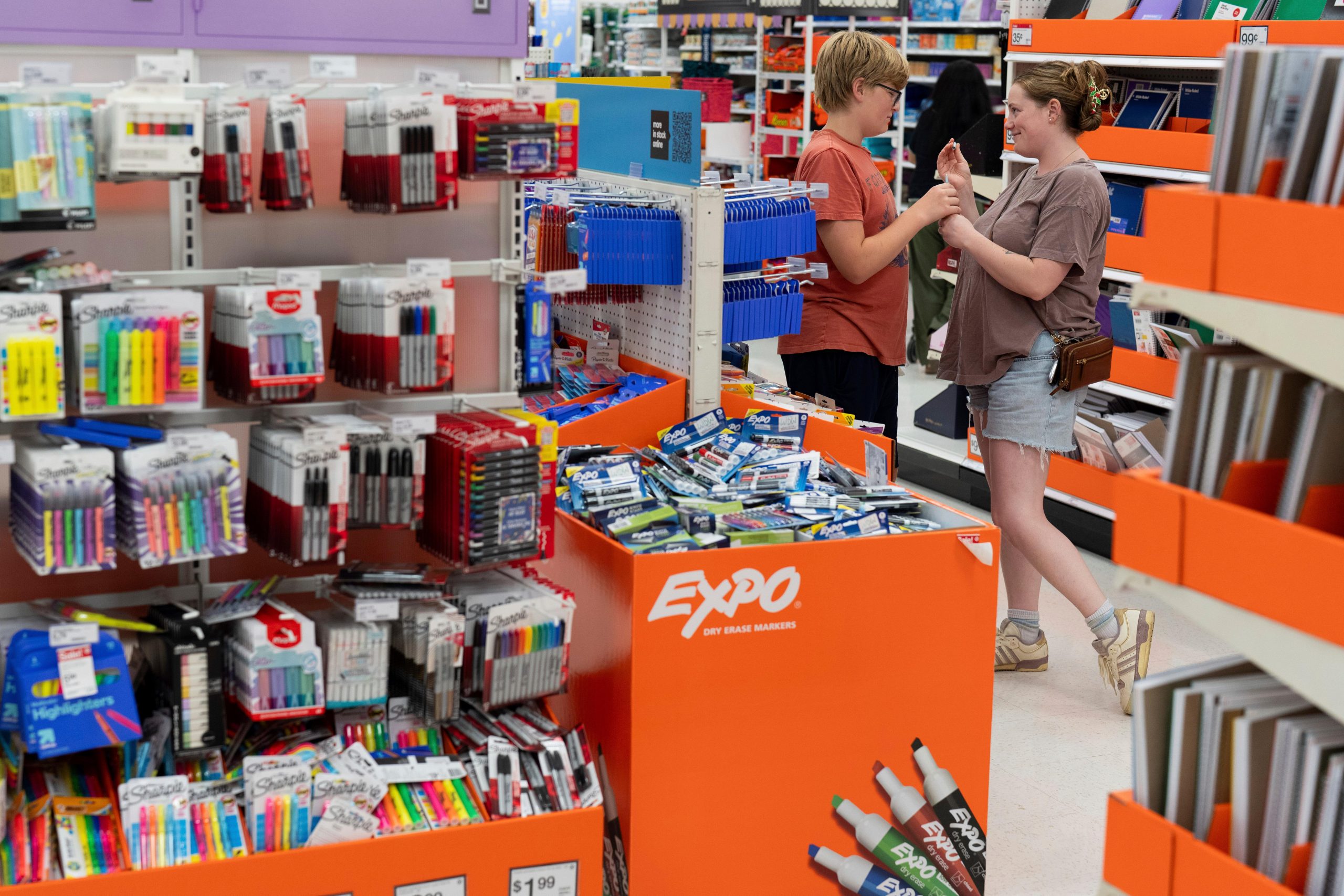 Kylie and Cash Zimmerman shop in the back-to-school supplies section...