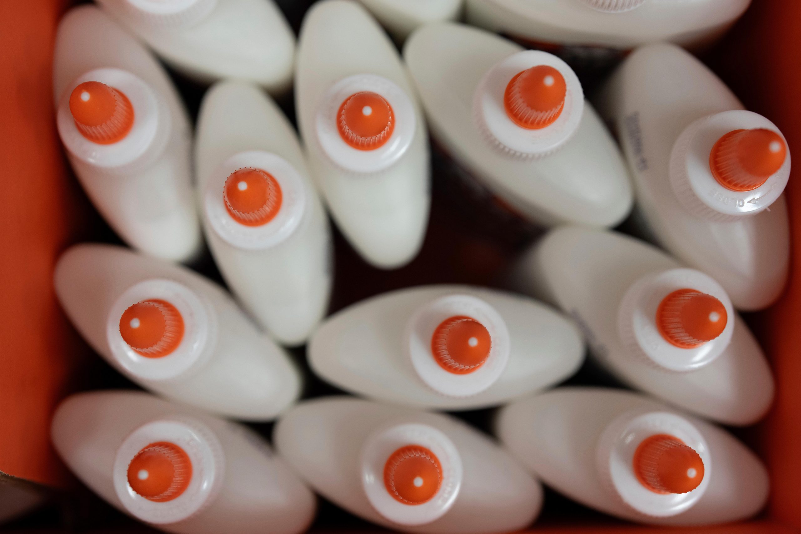 Glue is seen in a back-to-school supplies section of a...