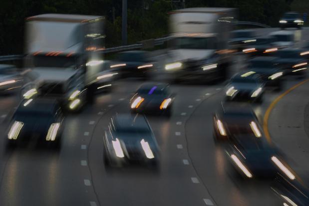 FILE - Vehicles drive along a highway July 30, 2025, in Cincinnati. (AP Photo/Joshua A. Bickel, File)