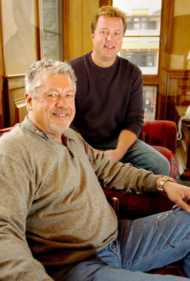 Chuck Horning, left, and his son Chad Horning sit for a portrait in the offices of Telluride Ski and Golf LLC in Mountain Village on March 3, 2005. (Photo by Shaun Stanley/The Denver Post)